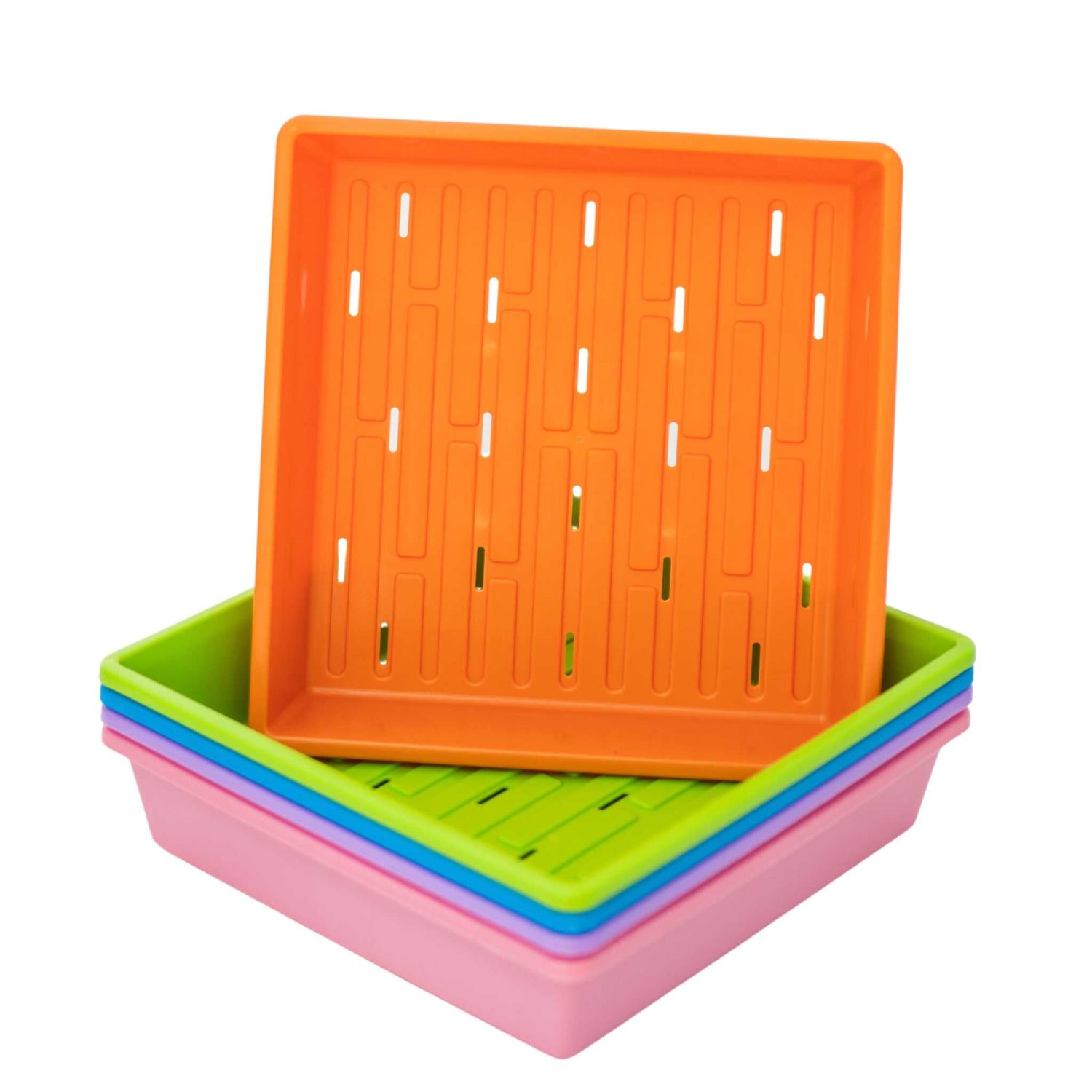 Orange plastic seed tray stacked on other trays 