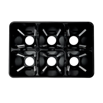 black plastic seed tray inside showing holes on white background 