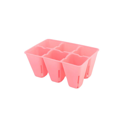 Pink seed tray on a white background 